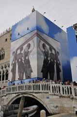 Doge's Palace and Bridge of Sighs covered with a large advertisement banner in Venice