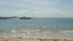 Pantai Tanjung Benoa with crystal clear water and boats