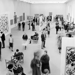 Exhibition of Jackson Pollock's paintings at Moderna Museet with visitors viewing the art