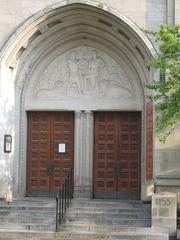 Entrance doors of the Oriental Institute with sculpture in the tympanum by Ulric Ellerhusen