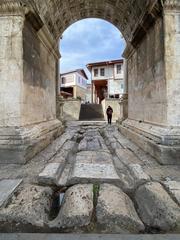 Deep grooves at Hadrian's Gate in Antalya, Turkey