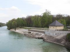 Run-of-the-river power plant below the Oberföhring weir on the Isar River in Munich with an adjacent fish ladder