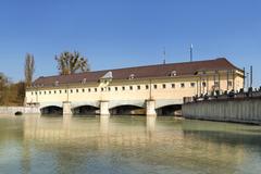 view of Isar river with Oberföhring weir in Munich, Germany