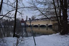 view of the Isar River and Oberföhring Dam in Hirschau and Obere Isarau nature reserve during winter