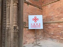 CHINA AID FOR SHARED FUTURE sign at Hanuman Dhoka, Kathmandu, Nepal (2023)