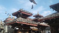 Basantapur Durbar Square with pigeons flying