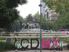 Mexico City skyline with skyscrapers and mountains in the background