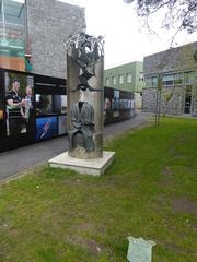 Ceiliuradh sculpture by John Coll in a park