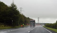 Wet N6 road with eastbound traffic