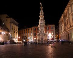 Piazza del Gesù Nuovo in Naples, Italy, with Santa Chiara's church in the background