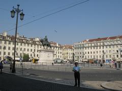 Praça da Figueira in Lisbon with historical buildings and statue