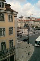 Praça da Figueira in Lisbon with statue and historic buildings