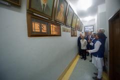 U.S. Secretary of State John Kerry looking at those killed in an attack in Dhaka, Bangladesh