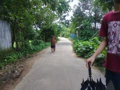 narrow road in Hajipur, Bijoynagar Upazila, Bangladesh