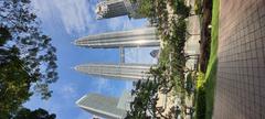 Petronas Twin Towers from KLCC Park on a clear sunny day