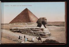 the Sphinx and the Pyramid of Cheops with men standing nearby