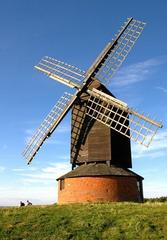 Brill Windmill on a grassy hill under a blue sky