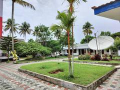 Vypin Lighthouse and its compound under a clear sky