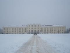 Schloss Schönbrunn covered in snow viewed from the Great Parterre