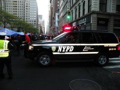 Protesters marching with banners on May Day in NYC