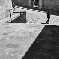 Photographic exhibition exploring unique corners of Barcelona's districts displayed in a gallery