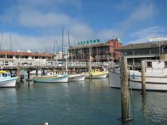 boats moored at Fisherman's Wharf in San Francisco with Alioto's restaurant in the background