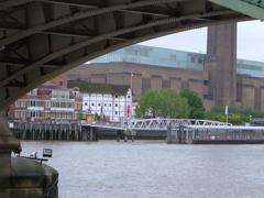 Globe Theatre and Tate Modern viewed from beneath Southwark Bridge