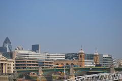 aerial view of London featuring the River Thames and iconic landmarks like Tower Bridge