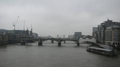 Aerial view of London in April 2009 featuring the River Thames, the London Eye, and surrounding buildings