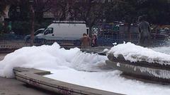 Fountain at Plaza de España covered with foam