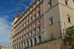 Panoramic view of Toledo, Spain, featuring historic architecture and the Tagus River