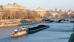 Barge with coal in Paris near Pont Neuf