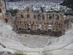 Athens cityscape with historical landmarks and mountains in the background