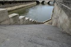 Staircase leading to the Seine at quai du Marché-Neuf in Paris