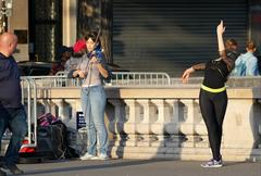 Musician and dancer on Saint-Michel Bridge in Paris