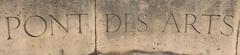 Inscription on Pont des Arts bridge in Paris