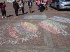 Street chalk art at Senate Square Helsinki depicting Freedom for Iran with Finnish, Swedish, and Iranian flags