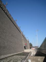 City wall beside the railway station