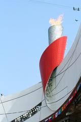 Beijing National Stadium Torch with stadium in the background