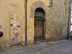 Arezzo town view with historic buildings and bell tower