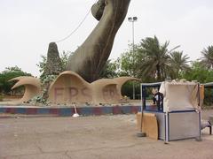 Base of one of the Hands of Victory with caretakers booth in 2004