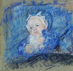 child resting on a blue pillow