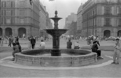 Antique photograph of Mexico City featuring fountains in Zócalo, 1958