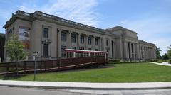 Lindell entrance to the Missouri History Museum with an ex-Milan streetcar in front