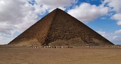 The Red Pyramid of Dahshur in Egypt against a clear blue sky