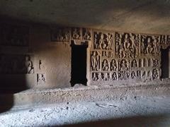 Kanheri Caves wall engravings of Buddha