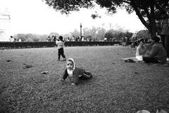 child embracing mother during Christmas visit to Victoria Memorial in Kolkata