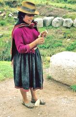 woman spinning next to Tambomachay Ruins