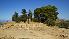 Agrigento cityscape with historical buildings and lush greenery