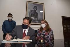 Defense Secretary Dr. Mark T. Esper signs guestbook at Gandhi Smriti museum